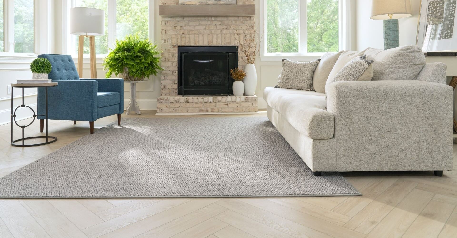 Living room with Karastan carpet and hardwood flooring 