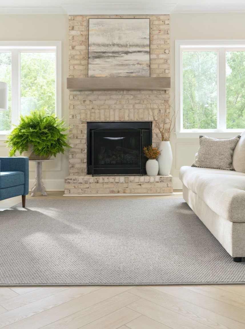 Living room with Karastan carpet and hardwood flooring 
