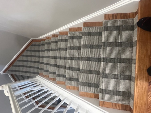 Custom stair runner installation in a Maryland home by Jim Boyd's Flooring America