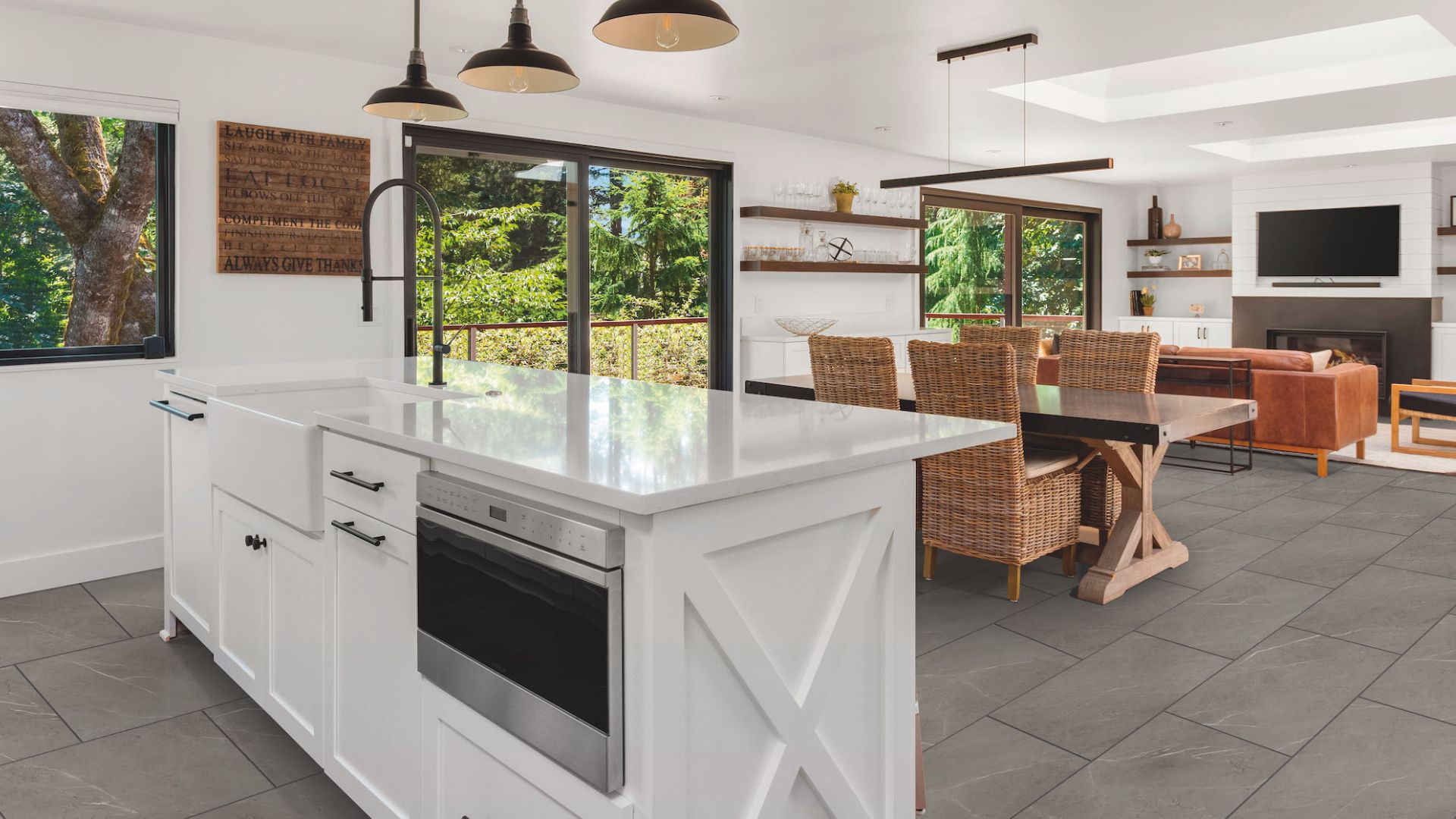 luxury vinyl tile flooring in a bright open concept kitchen and living room